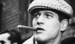 A devil-may-care kind of cap he wore, sans cigar and he didn't look like Paul Newman.